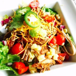 Crock Pot pork carnitas, made the 21 Day Fix way, are healthy, easy to make, and oh so delicious! Get the recipe from Confessions of a Fit Foodie