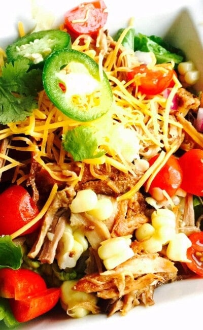 Crock Pot pork carnitas, made the 21 Day Fix way, are healthy, easy to make, and oh so delicious! Get the recipe from Confessions of a Fit Foodie