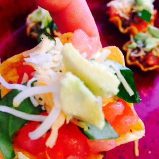 Taco dip may not sound like a healthy, 21 Day Fix approved snack, but it is! Even better news is you can scoop into it with chips, too! | Recipe on Confessions of a Fit Foodie