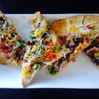 Taco pizza may sound unhealthy, but this 21 Day Fix version is anything but! For your next pizza night, try this easy, delicious healthy comfort food recipe.