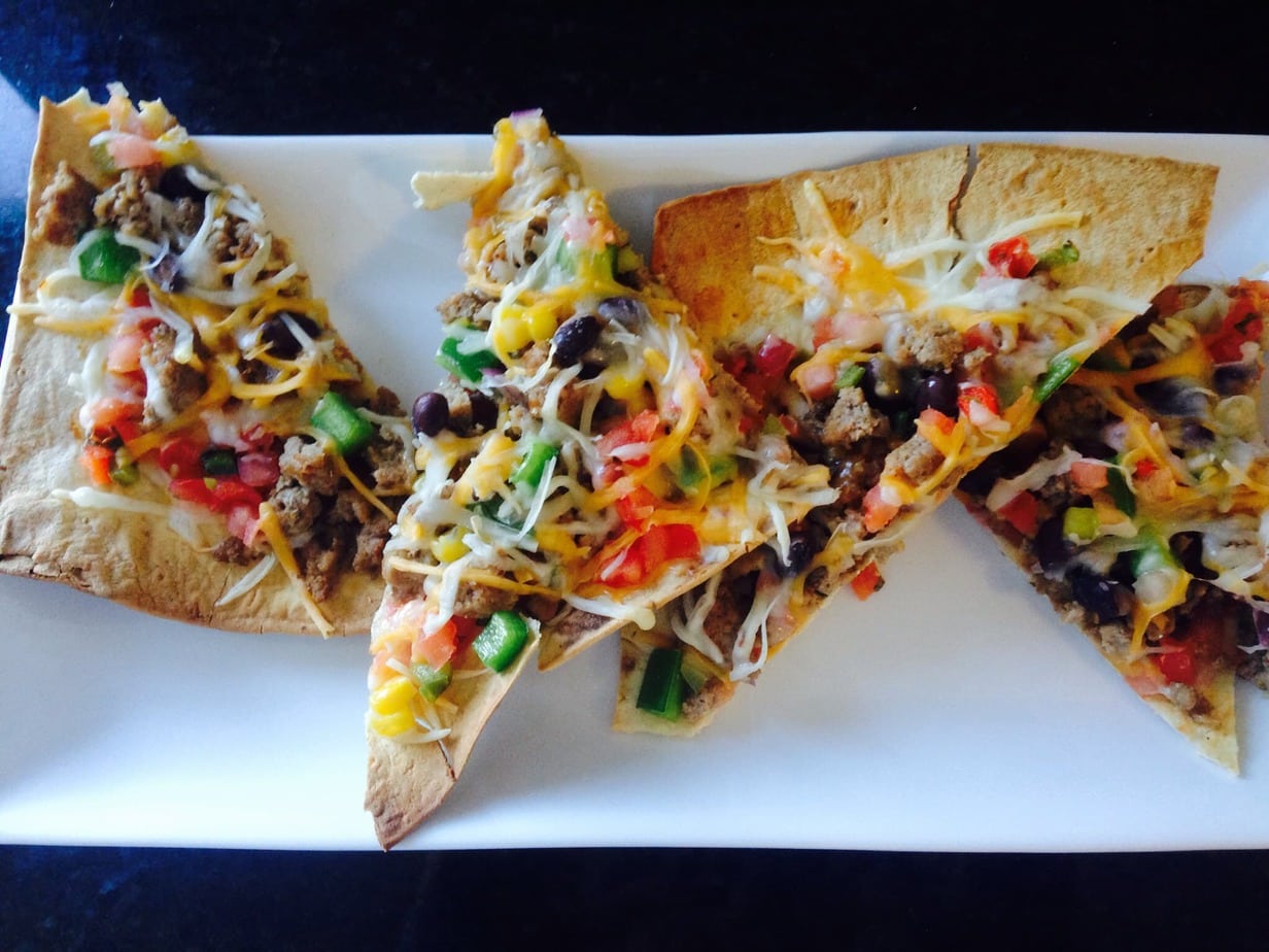 Taco pizza may sound unhealthy, but this 21 Day Fix version is anything but! For your next pizza night, try this easy, delicious healthy comfort food recipe.