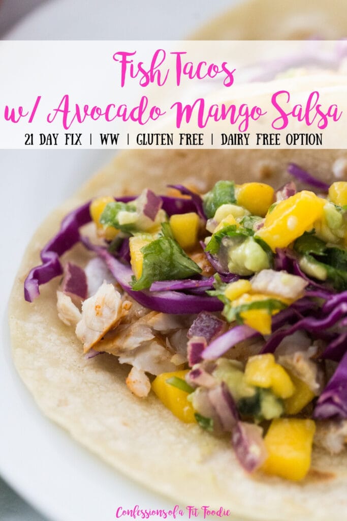 Close up of Fish Tacos topped with avocado mango salsa and red cabbage, with the text overlay- Fish Tacos w/ Avocado Mango Salsa | 21 Day Fix | WW | Gluten Free | Dairy Free Option | Confessions of a Fit Foodie