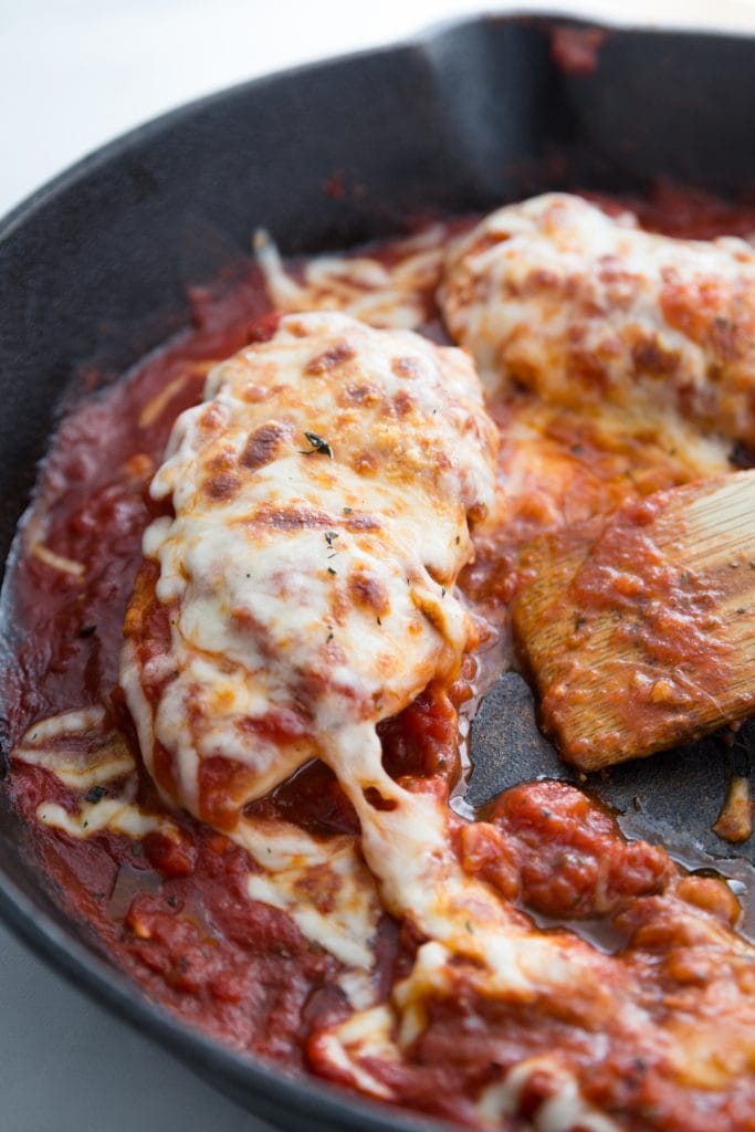 Cast Iron Skillet with Italian Chicken, tomato sauce, and Melted Cheese