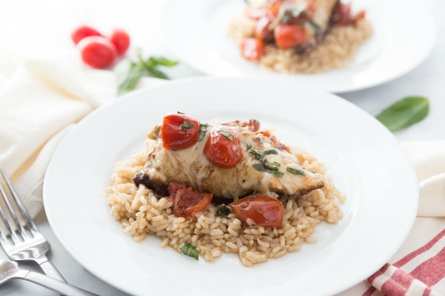 Caprese Chicken on a Plate over Brown Rice