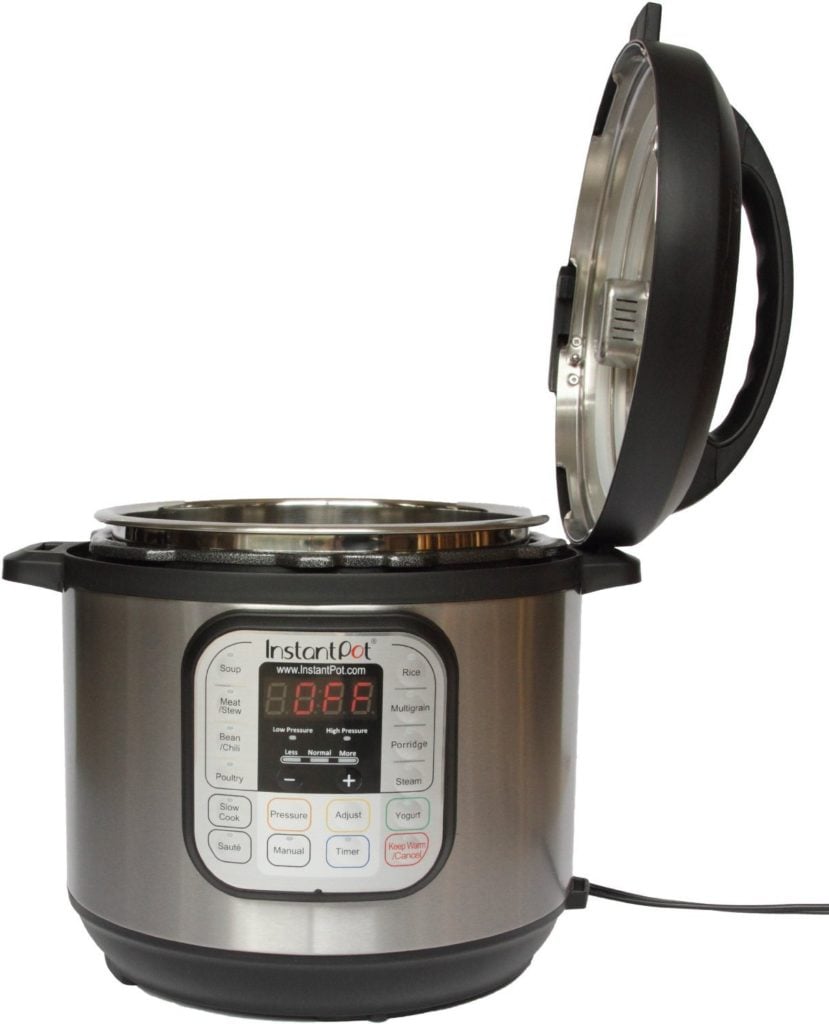 Stock photo of an Instant Pot with the lid resting in the up position.