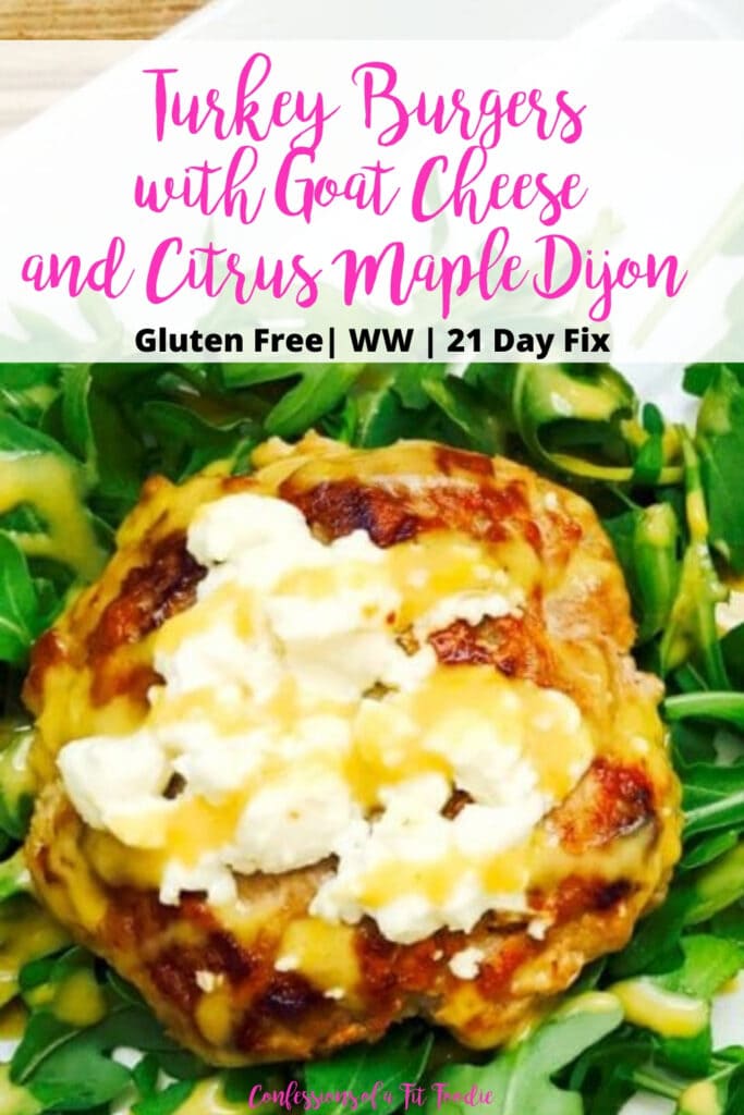 Close up photo of an easy turkey burger on a bed of arugula, with a pink and black text overlay - Turkey Burgers with Goat Cheese and Citrus Maple Dijon | Gluten Free | WW | 21 Day Fix | Confessions of a Fit Foodie