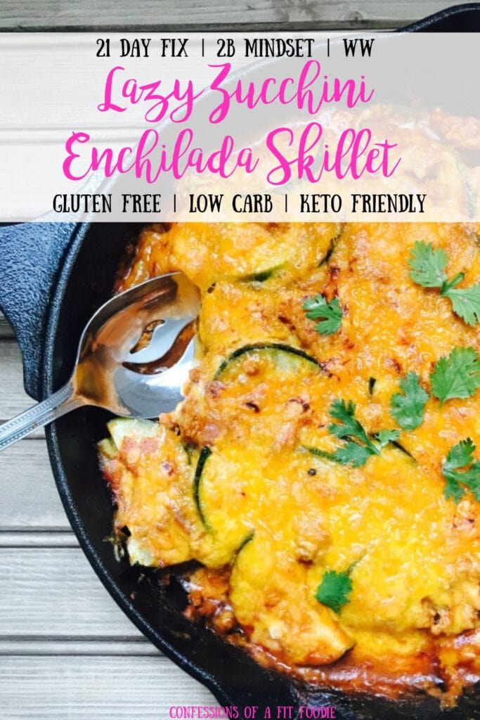 A cast iron skillet full of meat, zucchini, and enchilada sauce topped with melted cheddar cheese and cilantro. With the text overlay- 21 Day Fix | 2B Mindset | WW | Lazy Zucchini Enchilada Skillet | Gluten Free | Low Carb | Keto Friendly| Confessions of a Fit Foodie