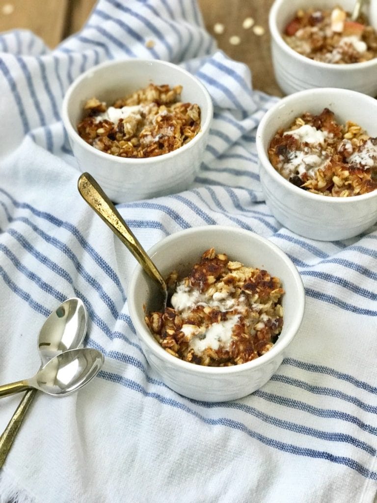 21 Day Fix Instant Pot Apple Crisp topped with coconut cream.