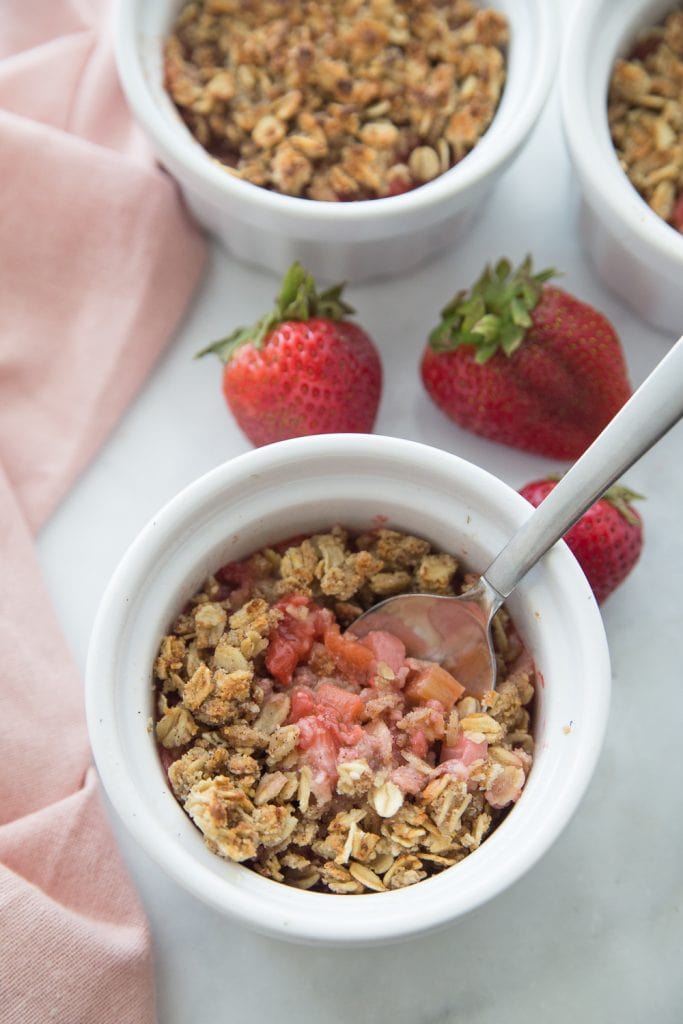 Two Ramekins with Strawberry Rhubarb Crisp Pink Kitchen Towel 