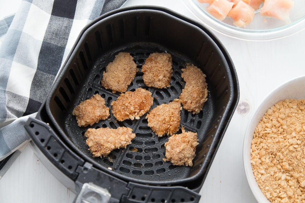 An overhead shot of a basket of Gluten-free Airfryer Buffalo Chicken Nuggets for the 21 Day Fix 