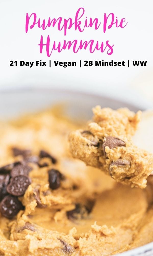 Close up photo of a spoonful of pumpkin hummus topped with chocolate chips and a pink and black text overlay - Pumpkin Pie Hummus | 21 Day Fix | Vegan | 2B Mindset | WW