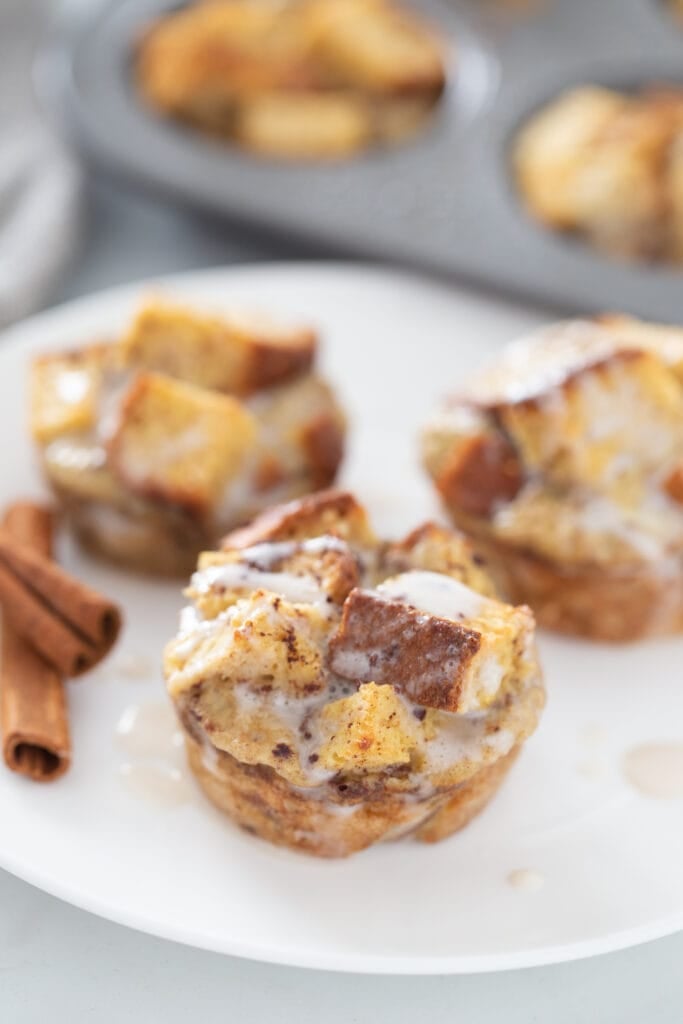A close up shot of three french toast casserole muffins