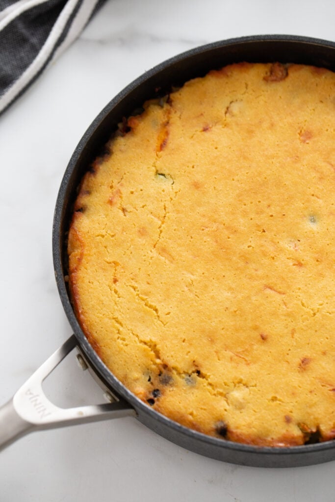 Overhead image: Cornbread skillet straight out of the oven.