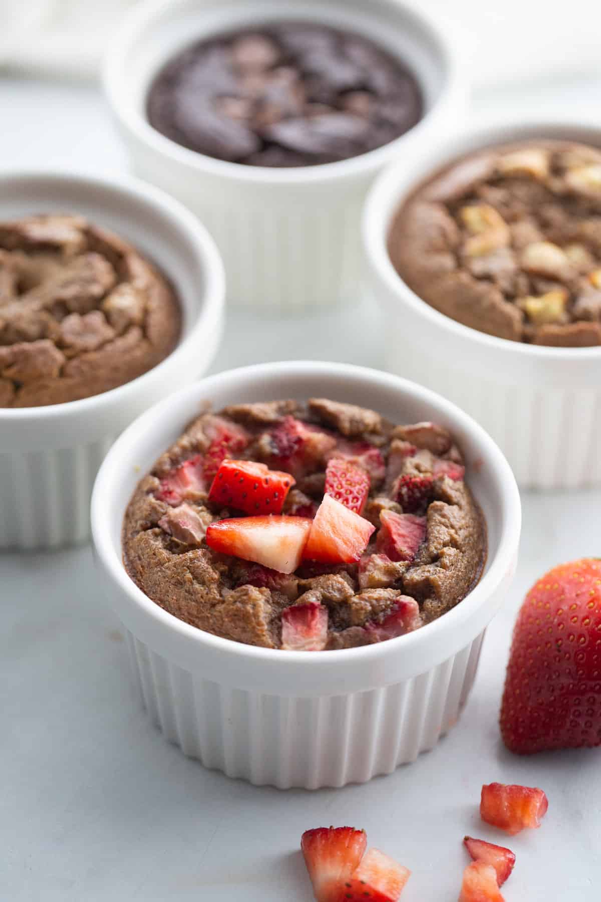 Blender baked oats 4 ways: strawberry, apple, peanut butter banana, and chocolate.