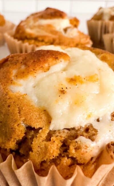 Close up of healthy pumpkin cream cheese muffin.