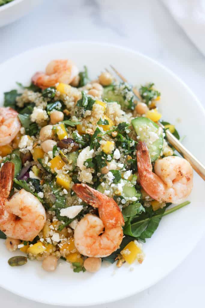 Jennifer Aniston salad shown topped with shrimp for extra protein.