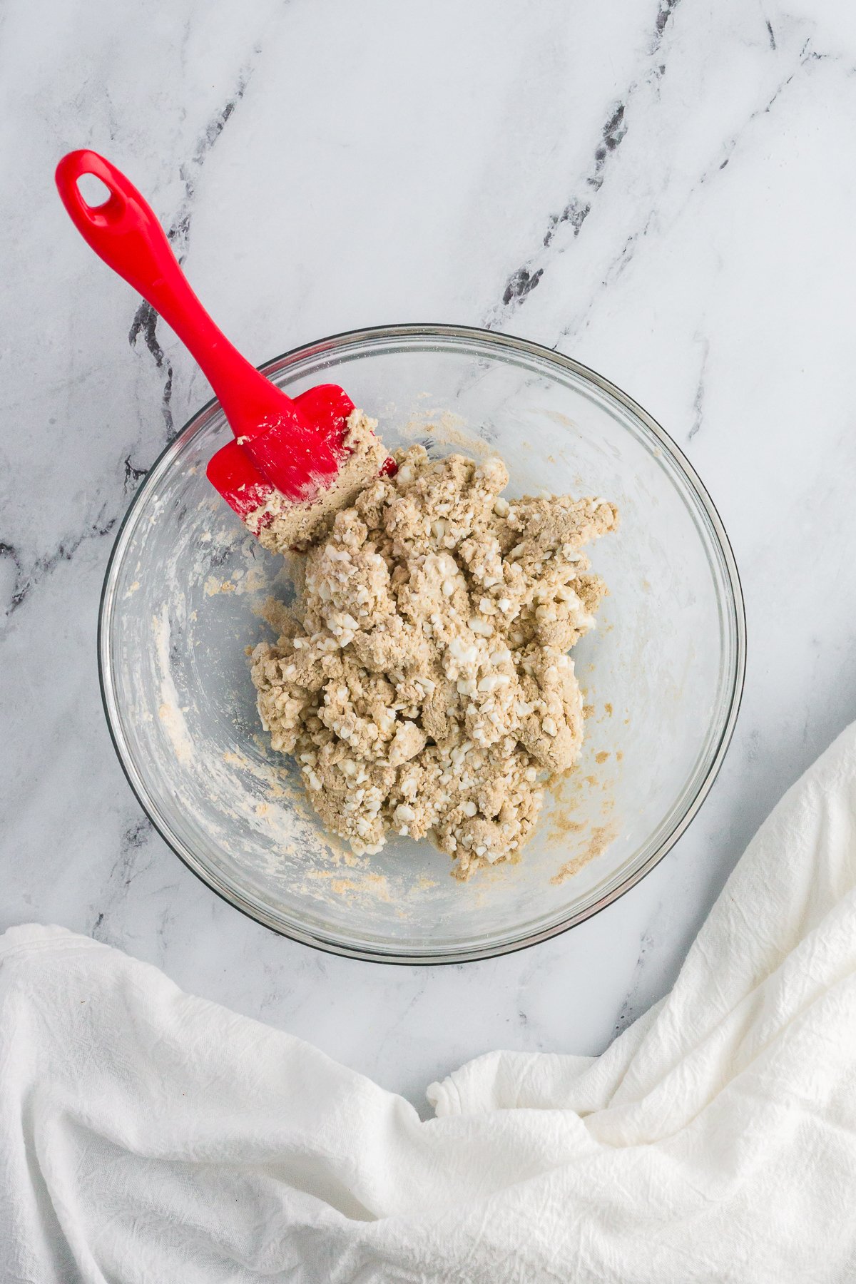 ingredients for high-protein bagels in a bowl, mixed.