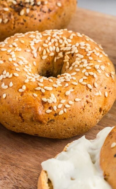 high protein bagels on a wooden cutting board