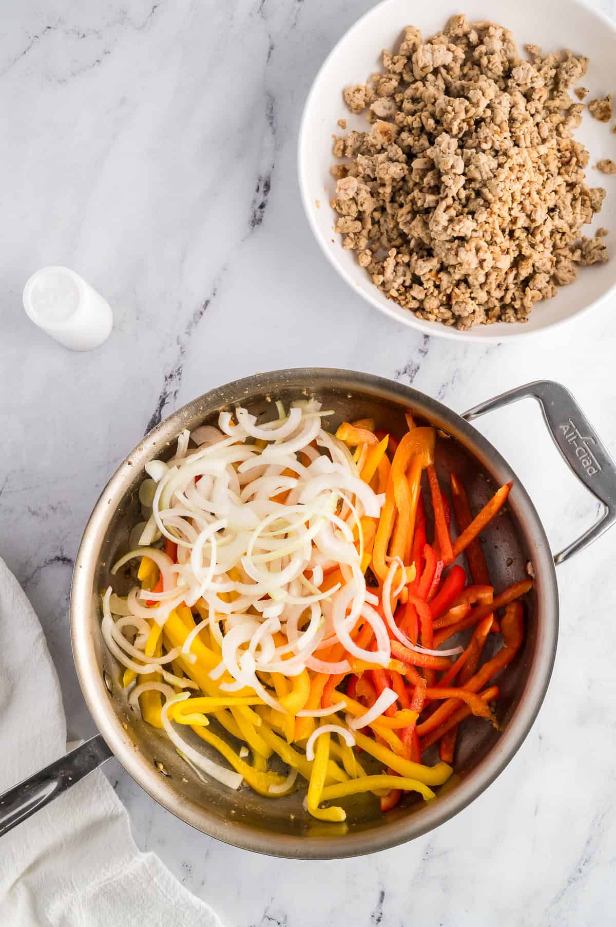 Onions and peppers before being cooked for chicken cheesesteak casserole.