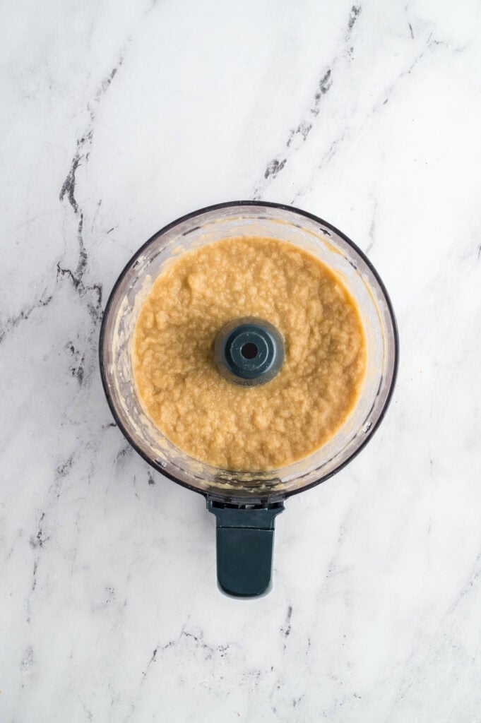 Pureed cauliflower in a food processor.